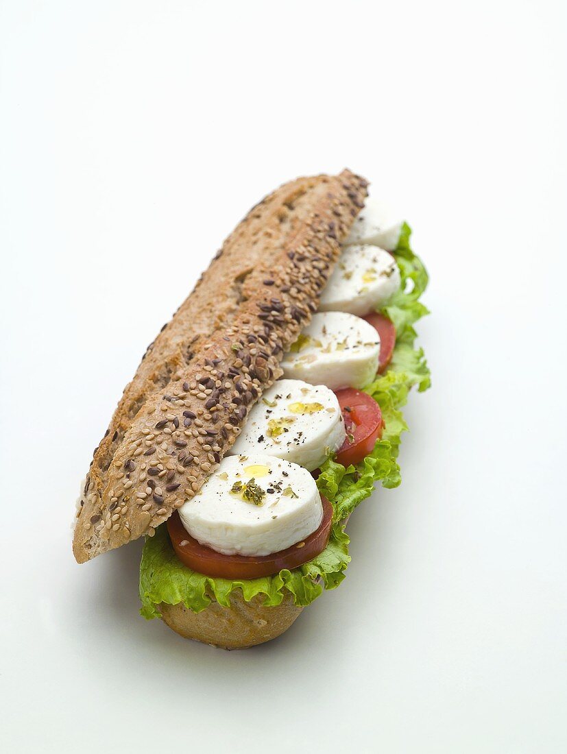 Soft cheese and tomato in wholegrain roll