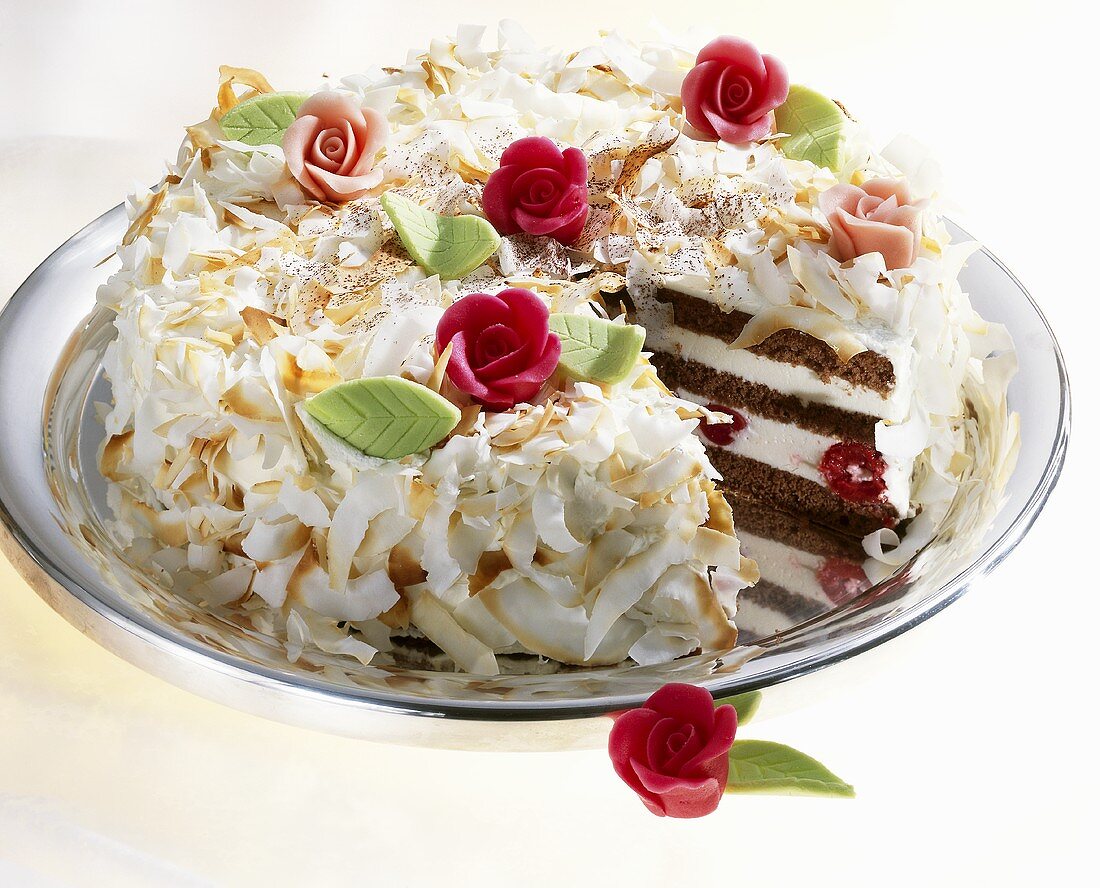 Cherry coconut cake with marzipan roses