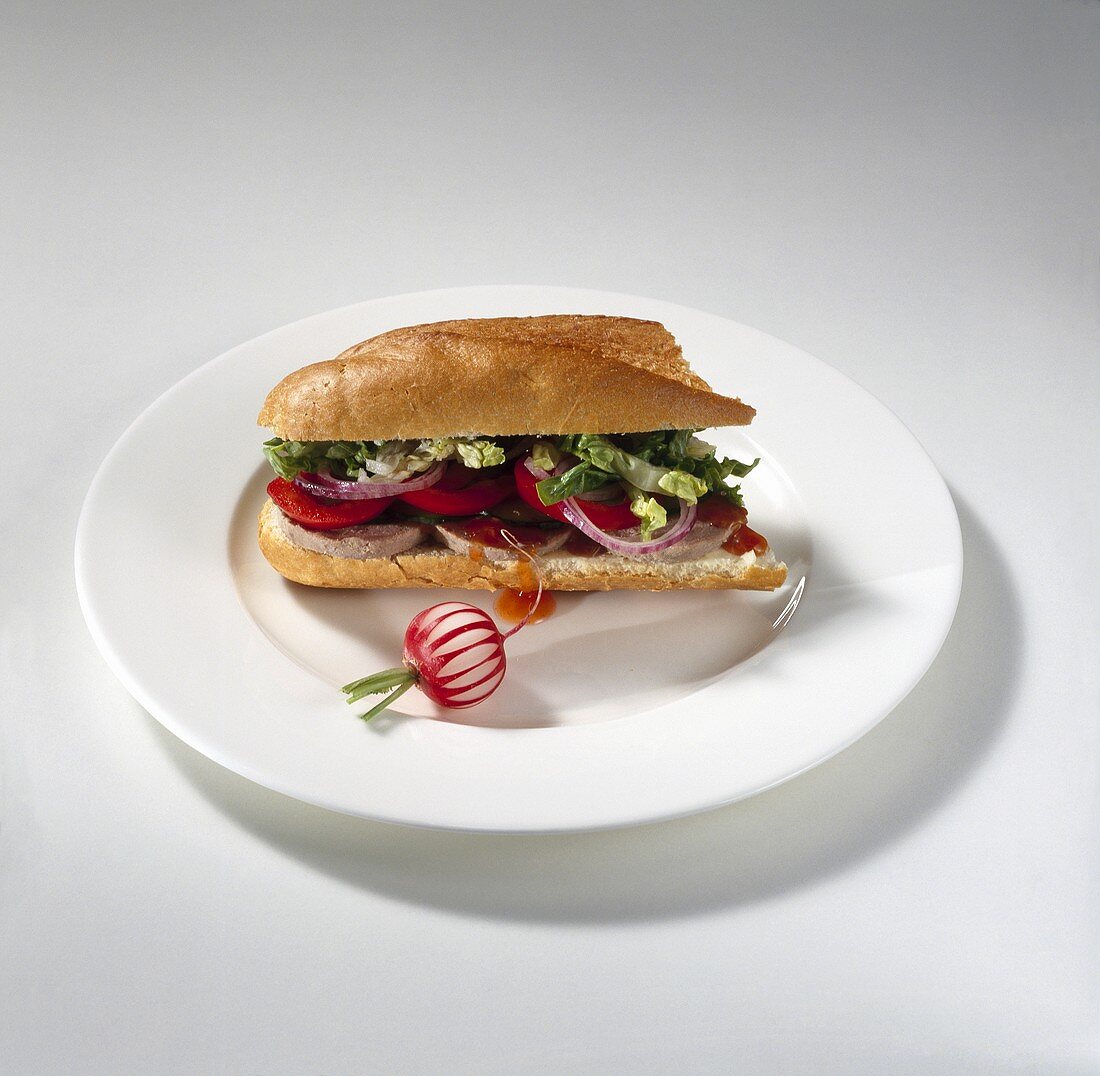 Liver sausage, lettuce and red pepper in baguette, radish