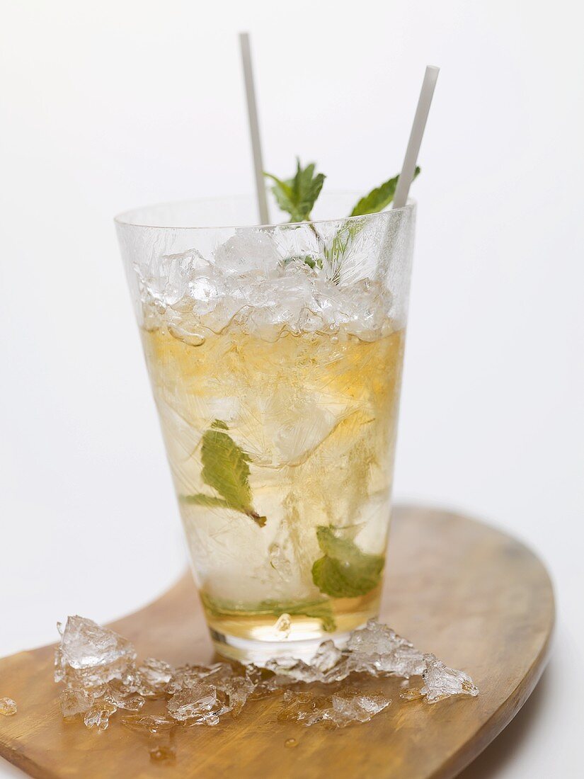 Mojito with mint, crushed ice and straws
