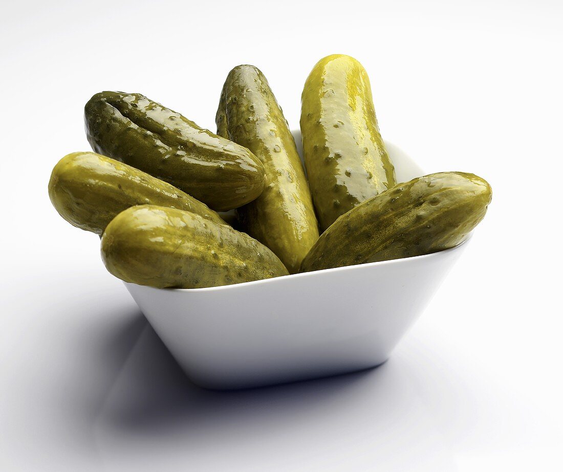 Pickles in a Square White Bowl