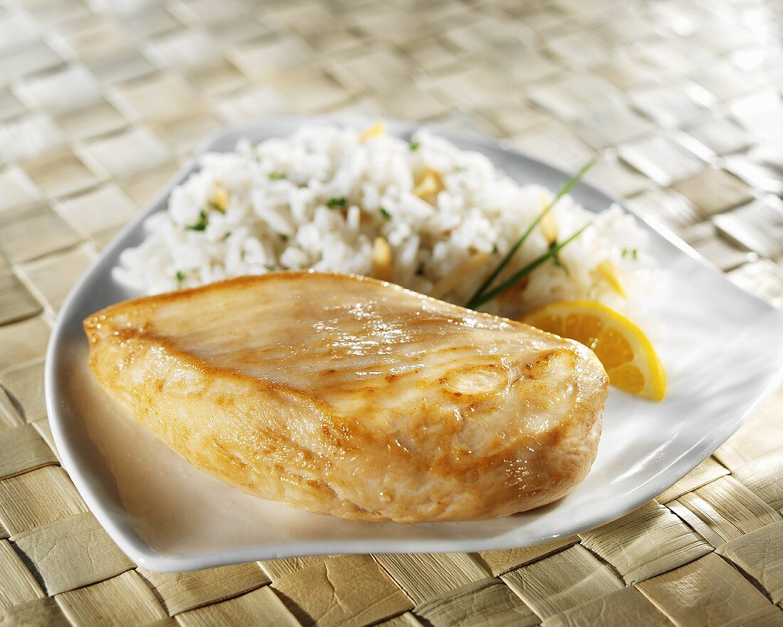 Chicken Breast with Rice on White Dish