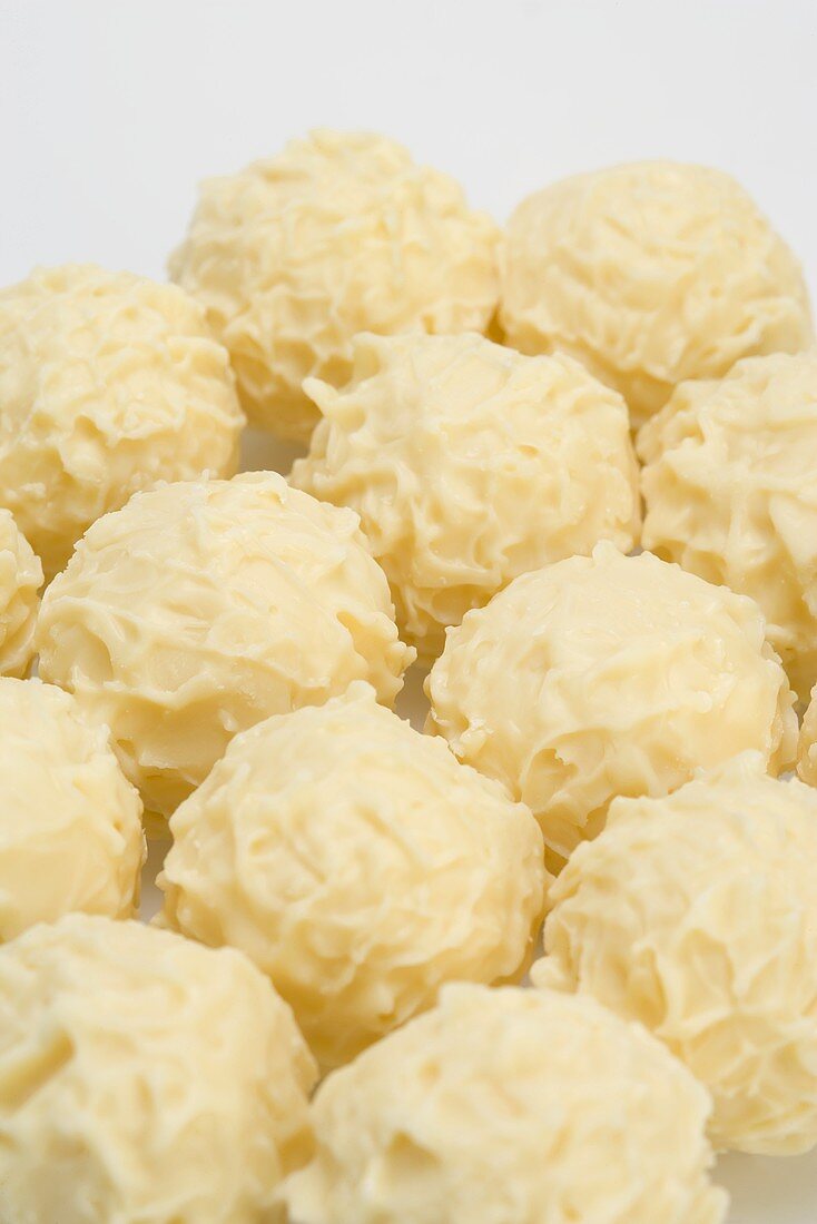 Several white chocolate truffles