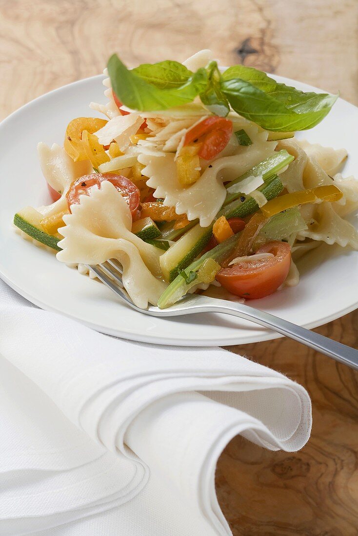 Farfalle primavera with vegetables and basil