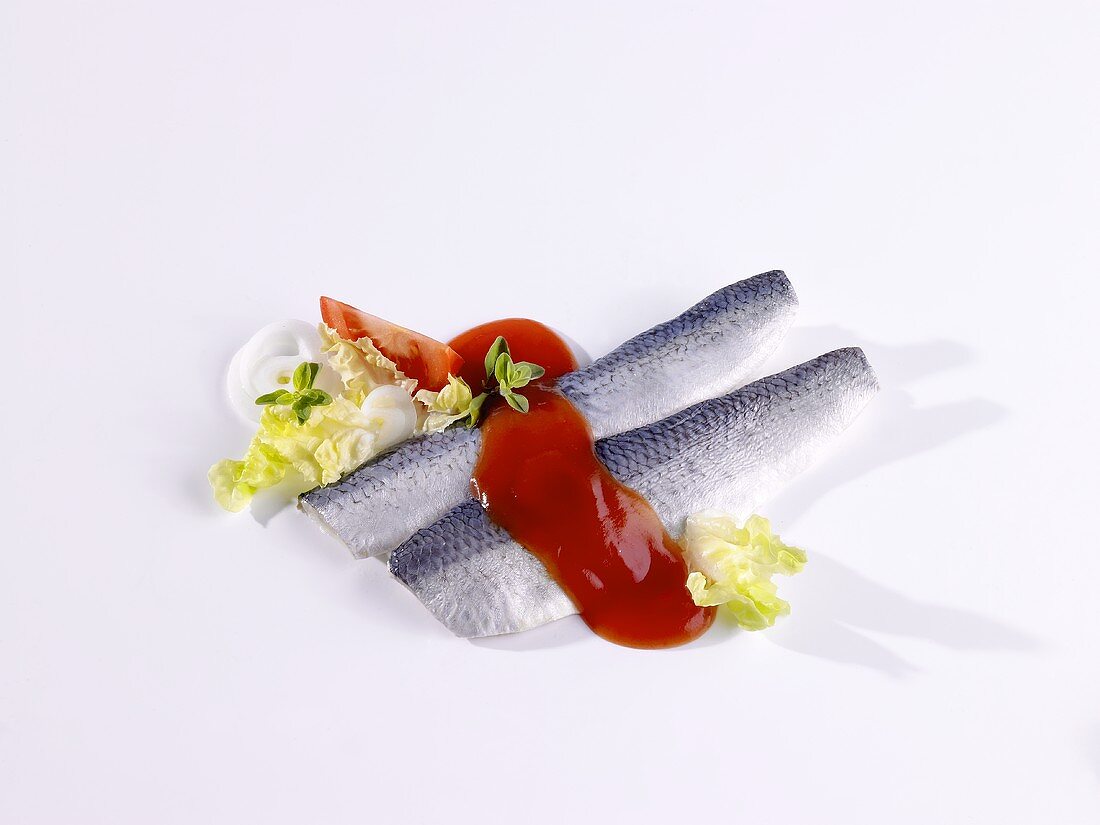 Herring fillets with tomato sauce