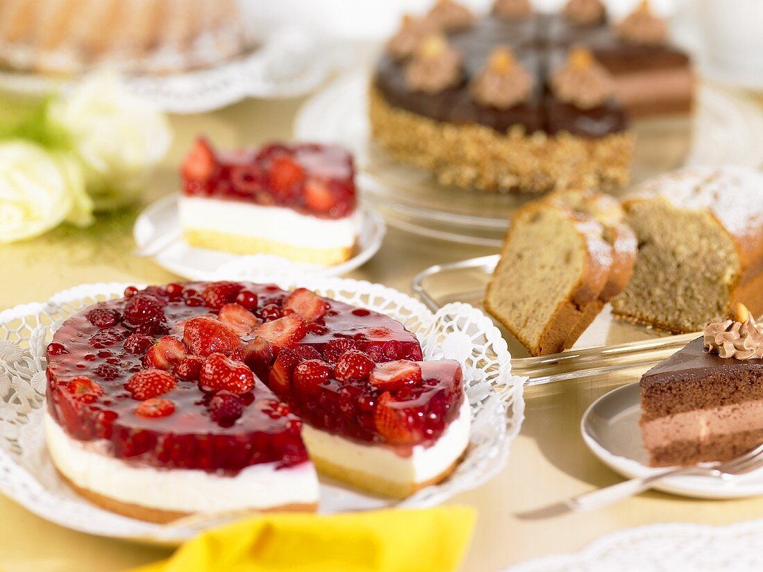 Cake buffet with cheesecake, chocolate cake, loaf cake