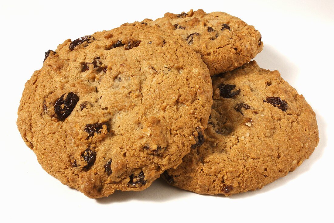 Three Oatmeal Raisin Cookies on White