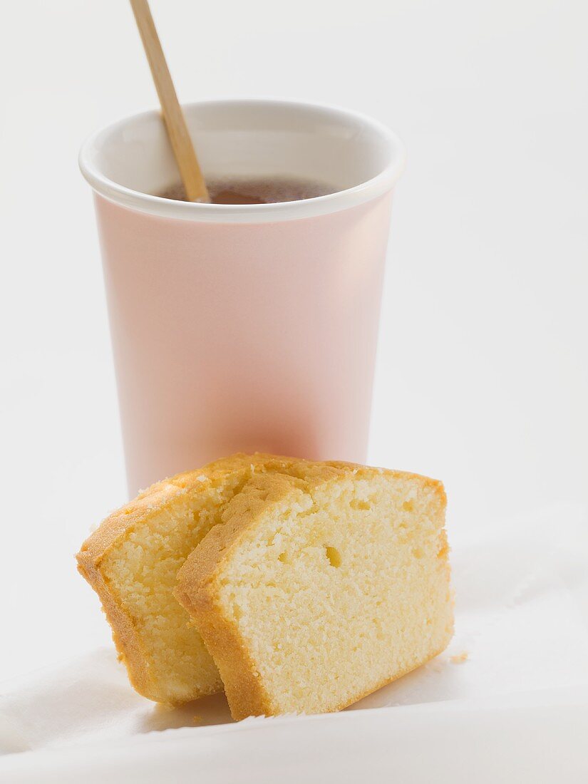 Two slices of lemon cake and tea