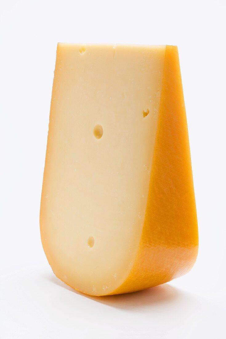 A piece of Gouda cheese