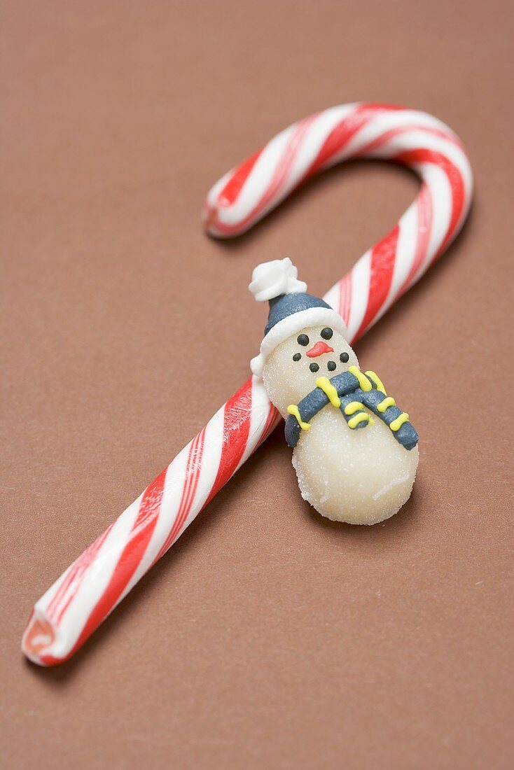 Candy cane and marzipan snowman