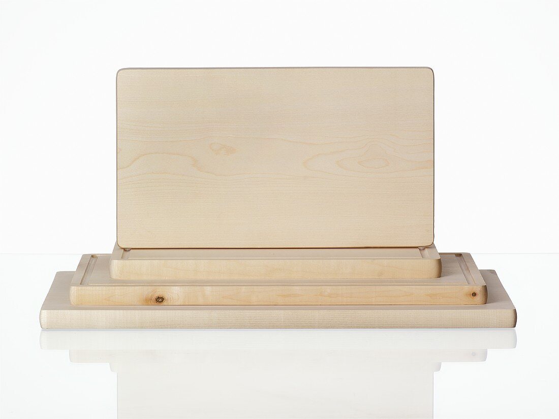 Several wooden chopping boards
