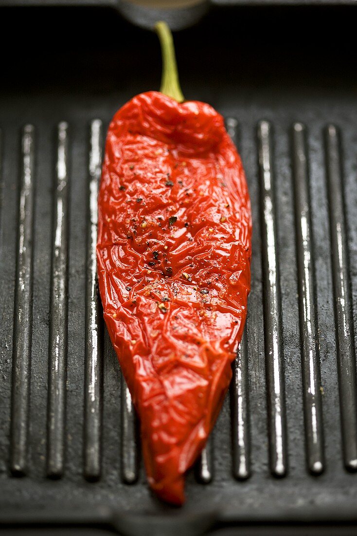 Red pepper in a grill frying pan