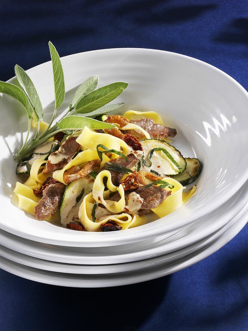 Tagliatelle with fried duck breast, courgettes and sage