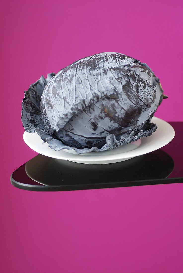 A red cabbage on a plate