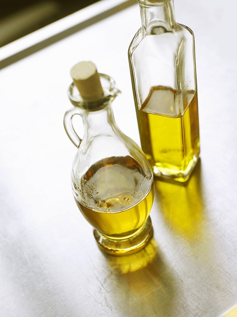 Olive oil in bottle and carafe