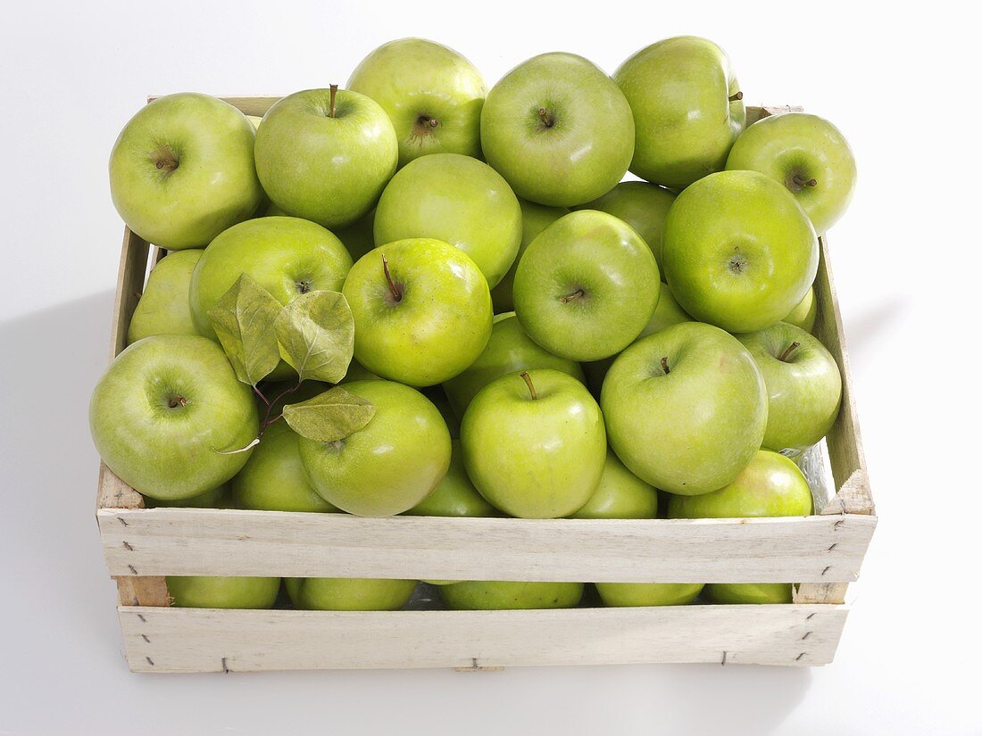 Granny Smith apples in crate