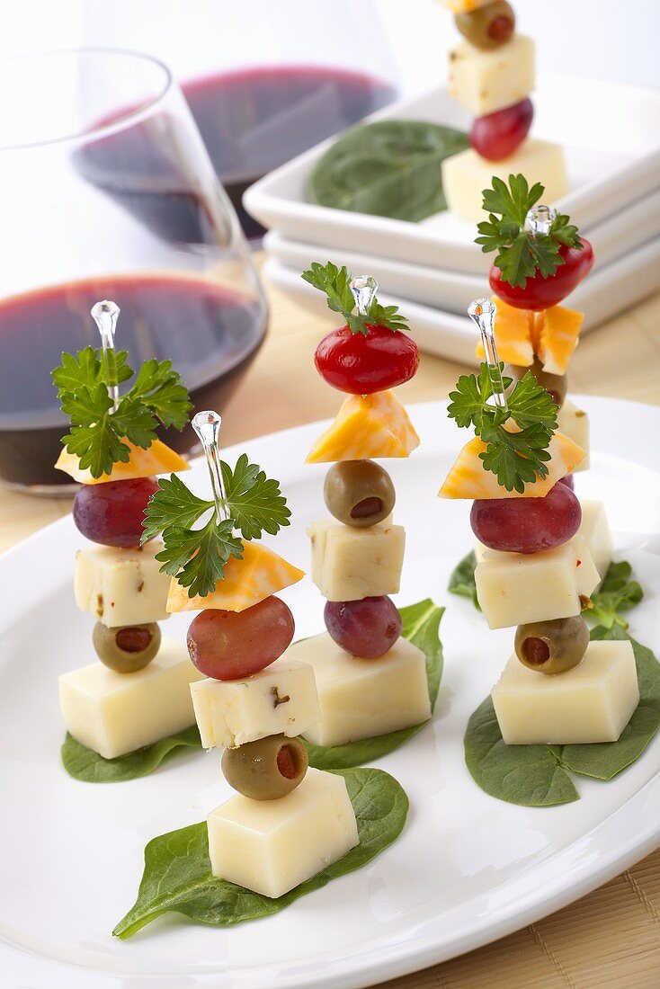 Cheese, grapes and olives on cocktail sticks