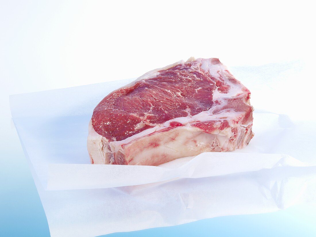 Ribeye steak on paper