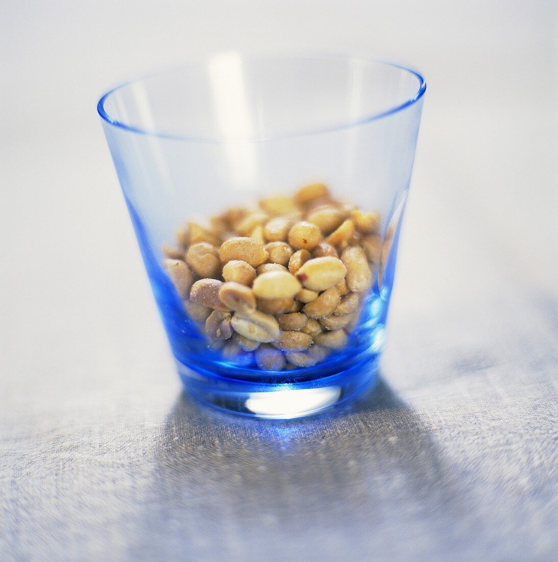 Salted peanuts in a glass