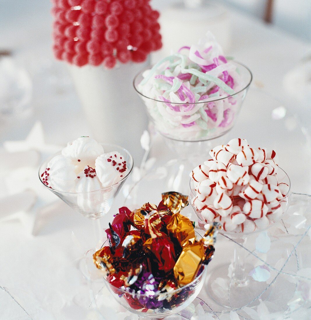 Different types of sweets in bowls