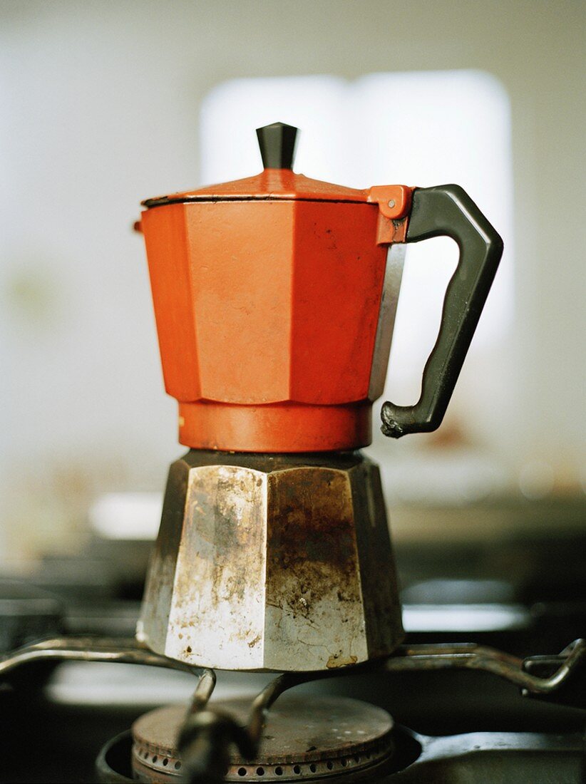 Old espresso pot on a gas cooker