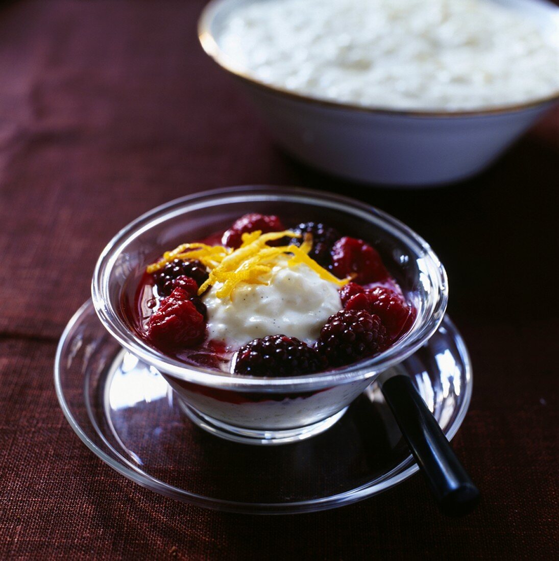 Rice pudding with warm berry sauce (Christmas dessert, Sweden)