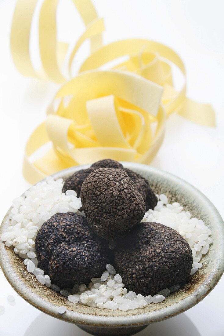 Black truffles (Chinese truffles), risotto rice, ribbon pasta