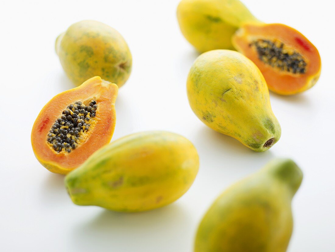 Papaya halves and whole papayas