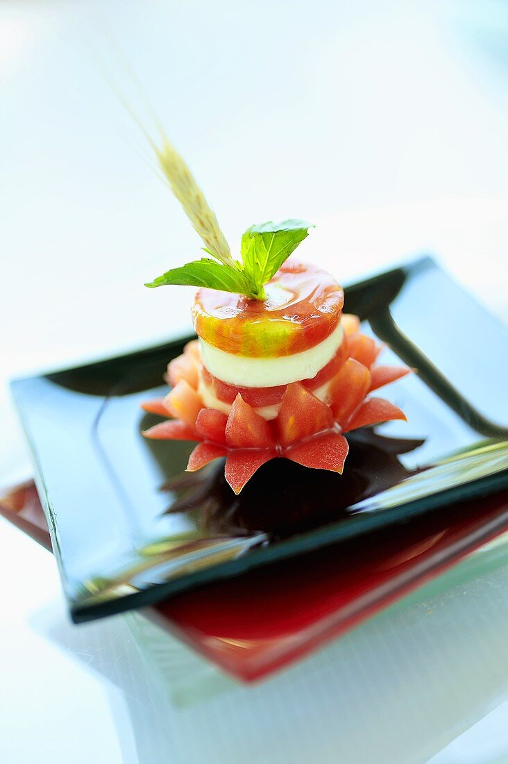 Tomato and mozzarella with carved tomato flower