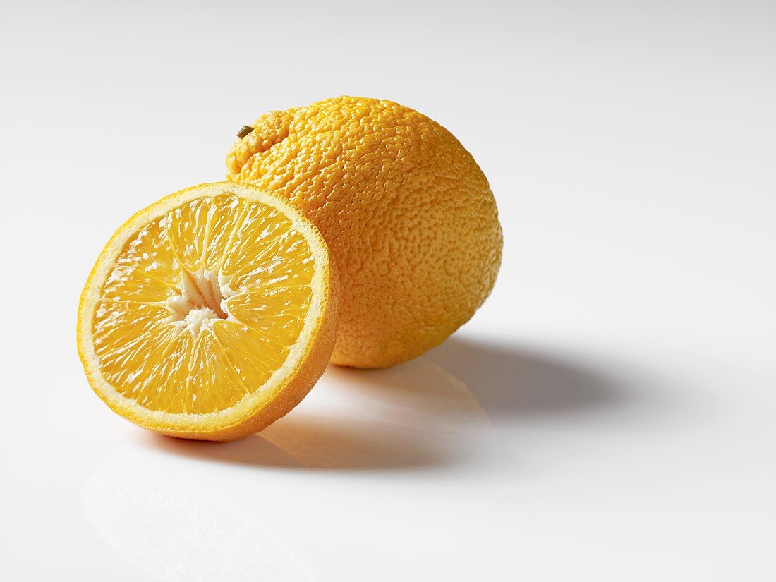 Whole orange and half an orange