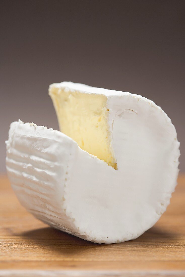 Goat's cheese with a section removed