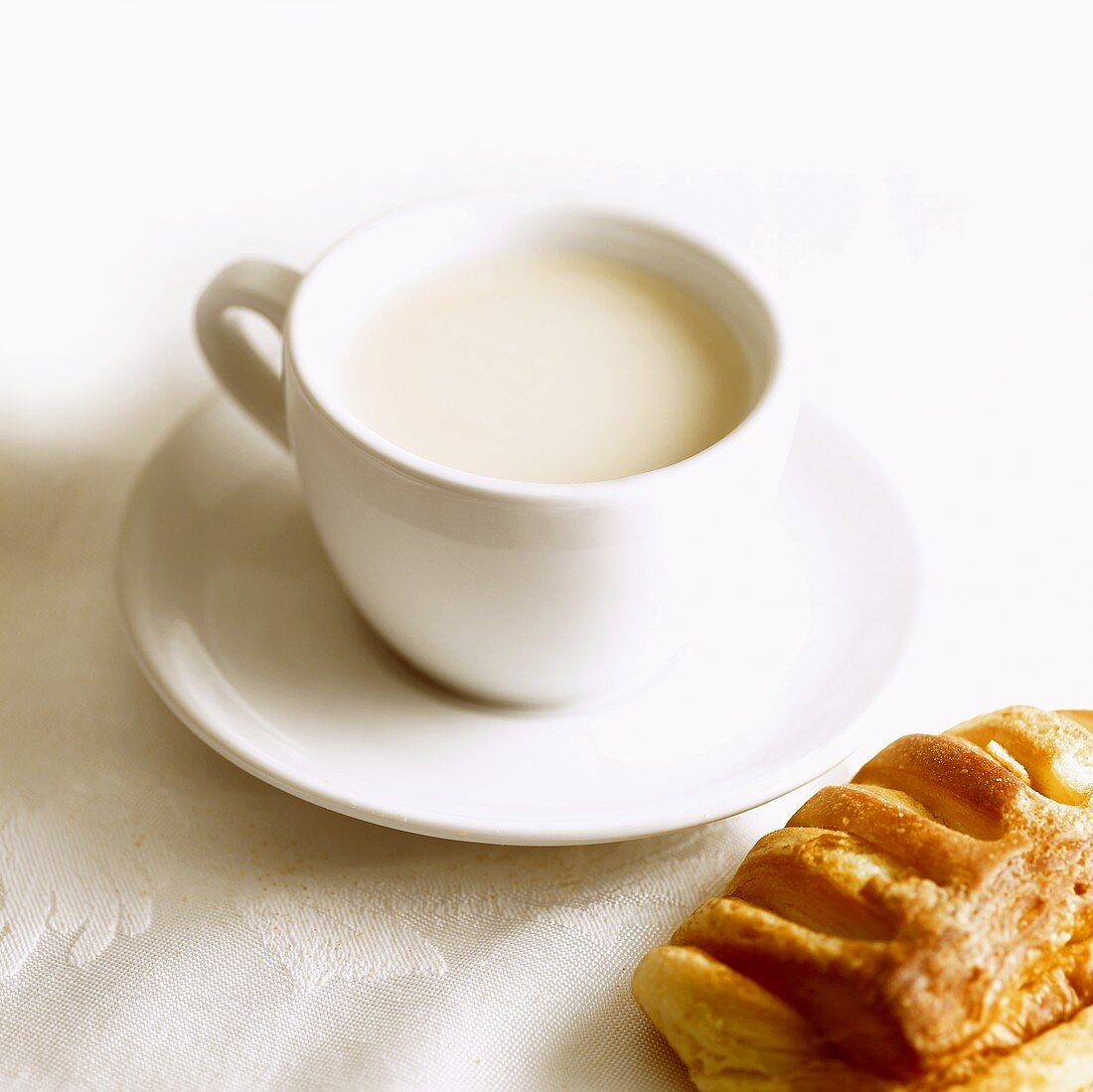 Cup of milk and puff pastry