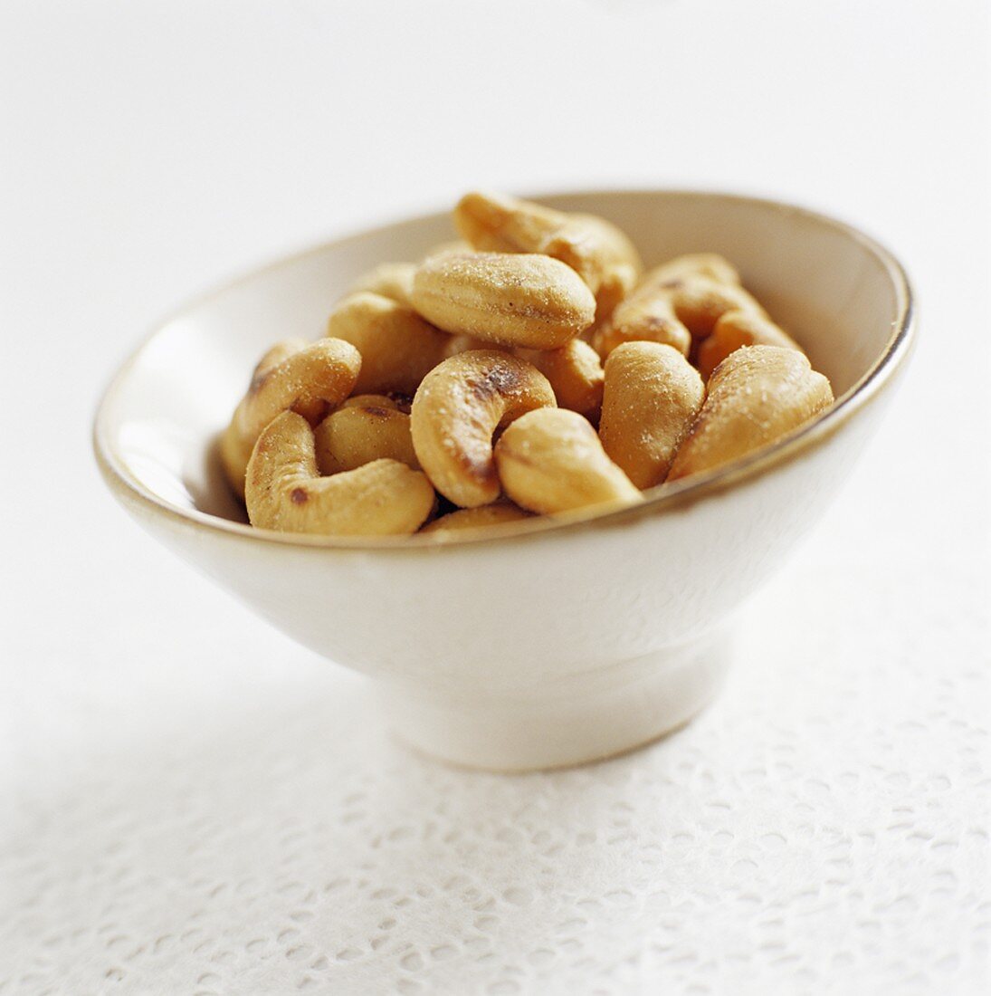 Shelled cashew nuts in ceramic bowl