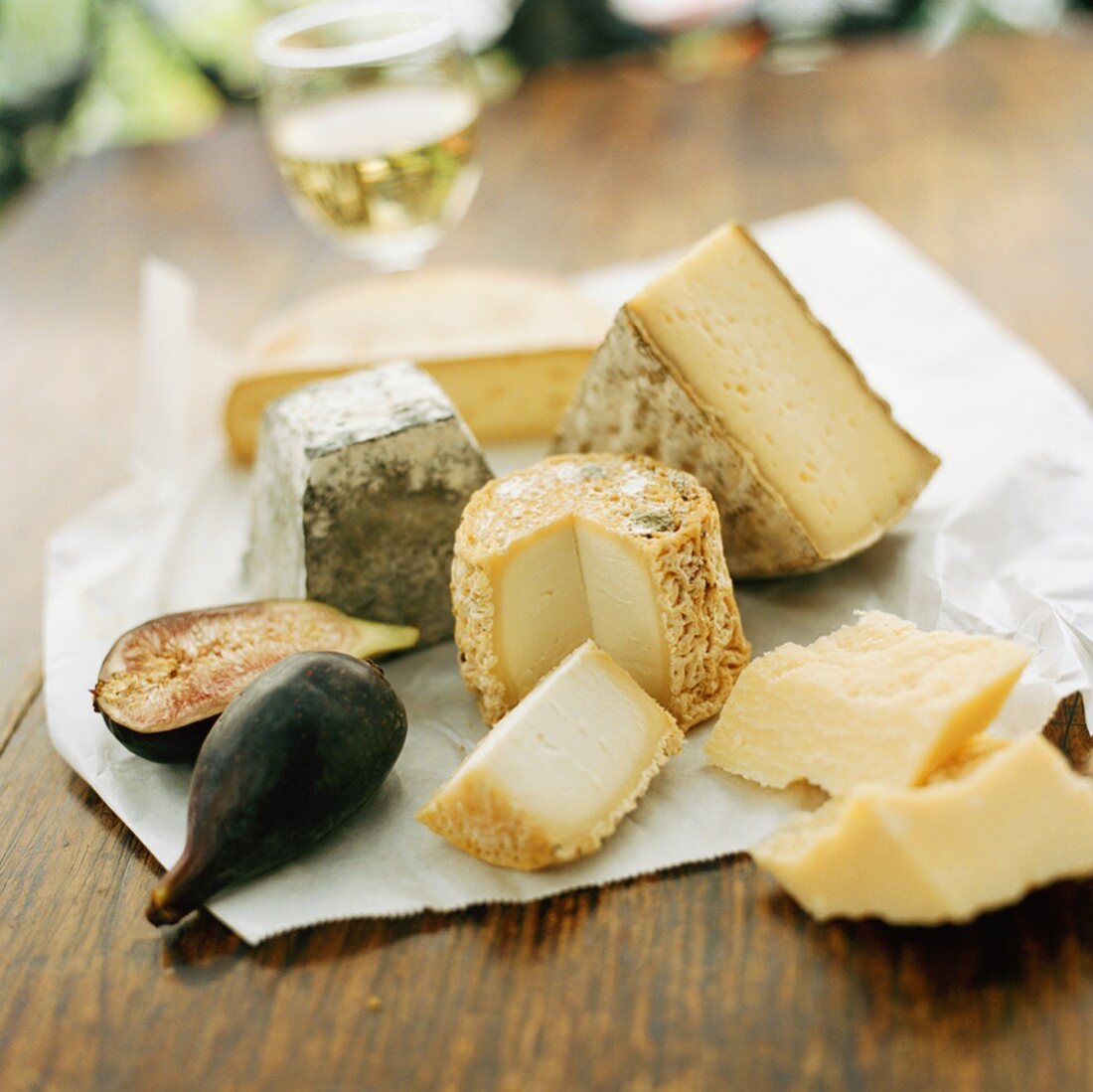 Various cheeses and fig