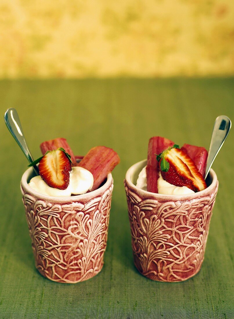 Strawberry-rhubarb desserts with cream