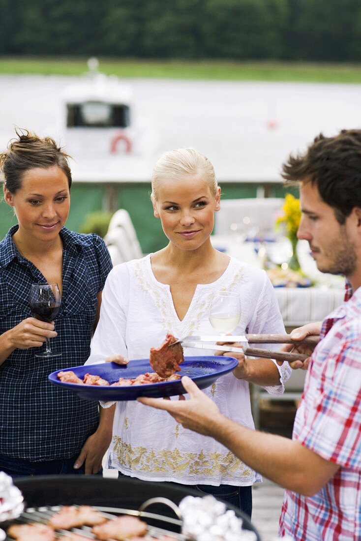 People at a barbecue