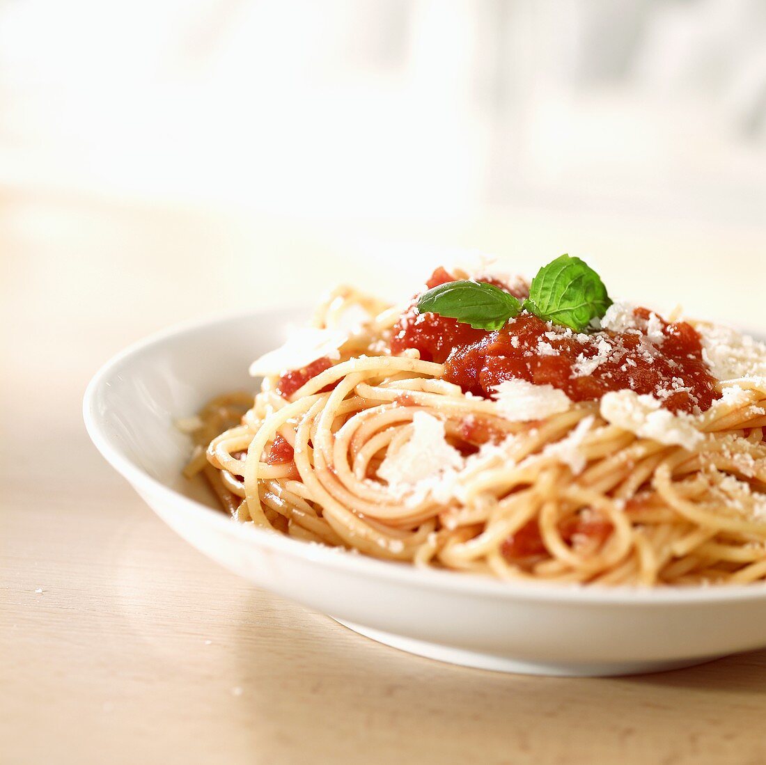 Spaghetti with tomato sauce and Parmigiano