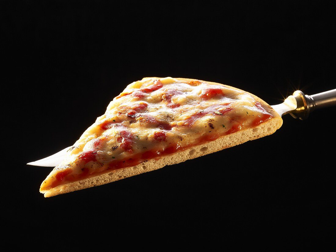 Slice of pizza on a knife