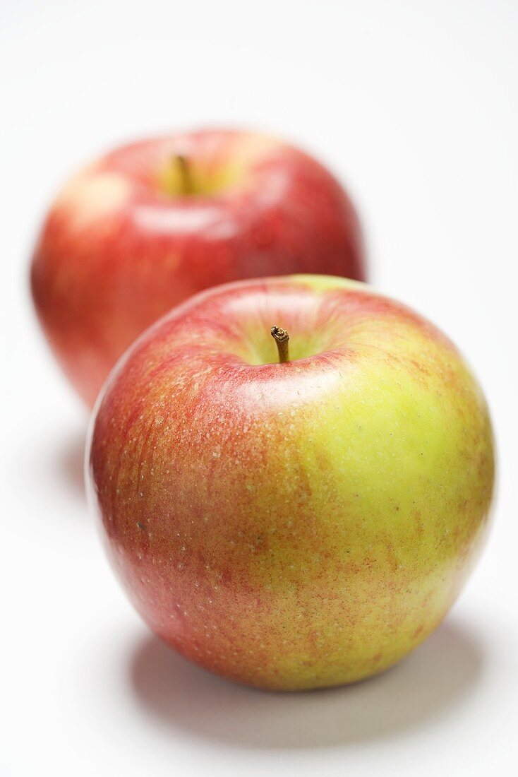 Two apples, variety 'Braeburn'
