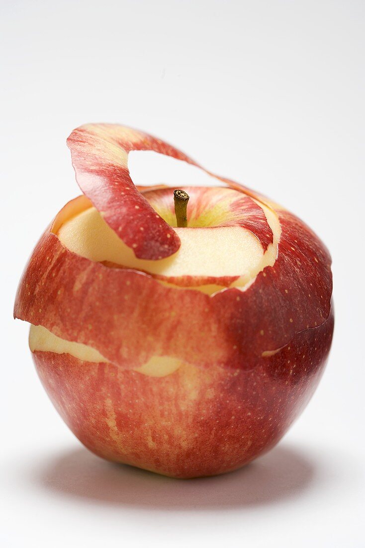 Gala apple, partly peeled