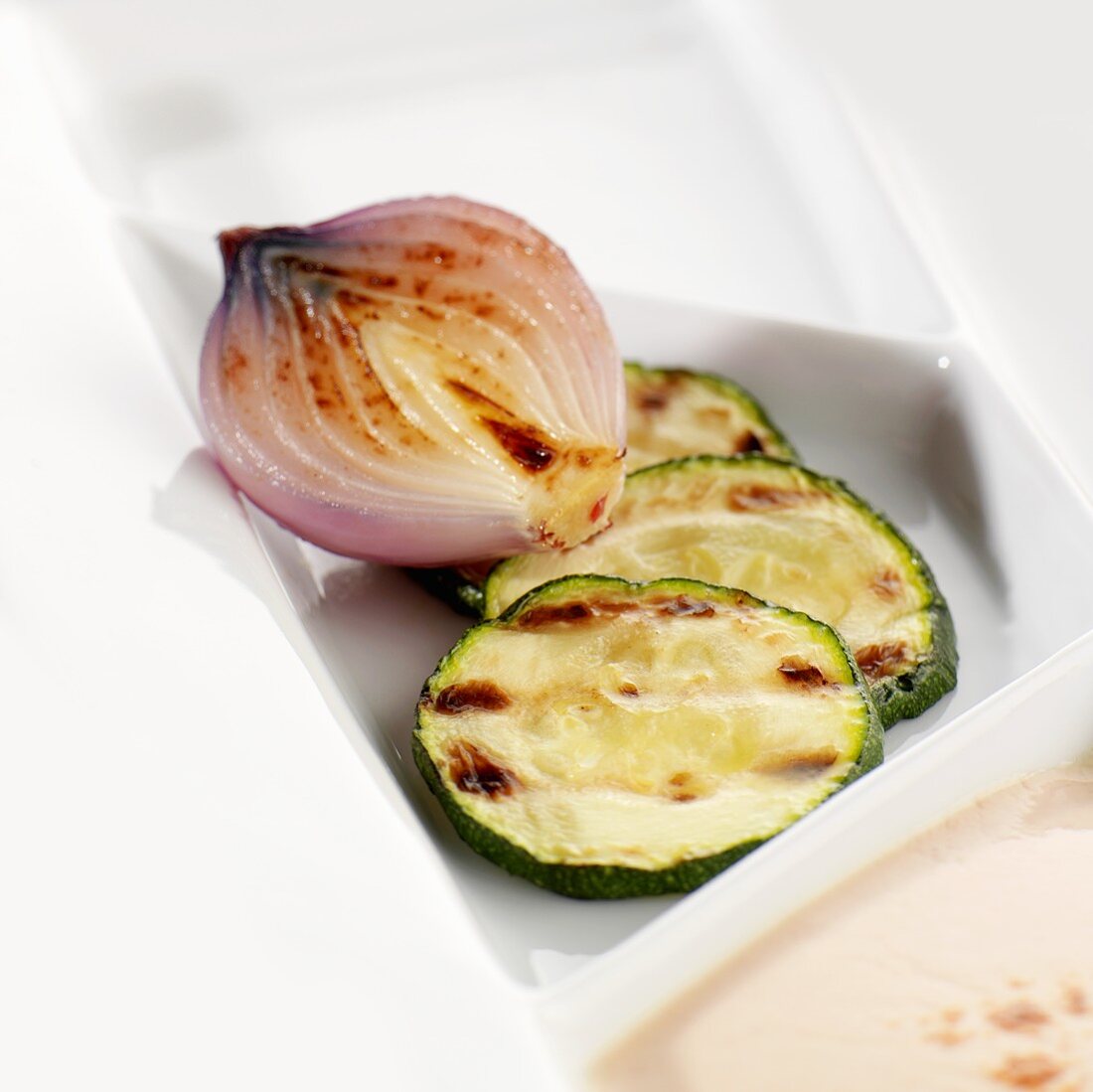 Grilled courgette and onion