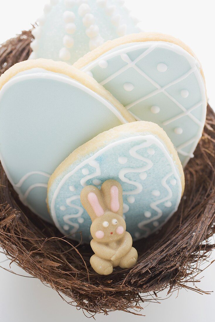 Biscuits and marzipan rabbit in Easter nest