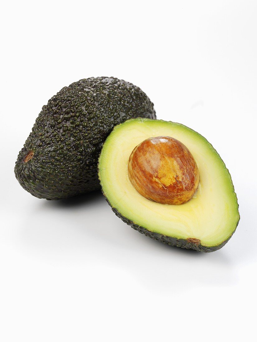 Whole avocado and half an avocado