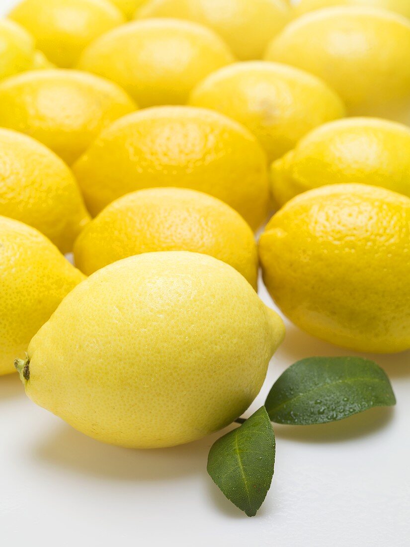 Lemons and two lemon leaves