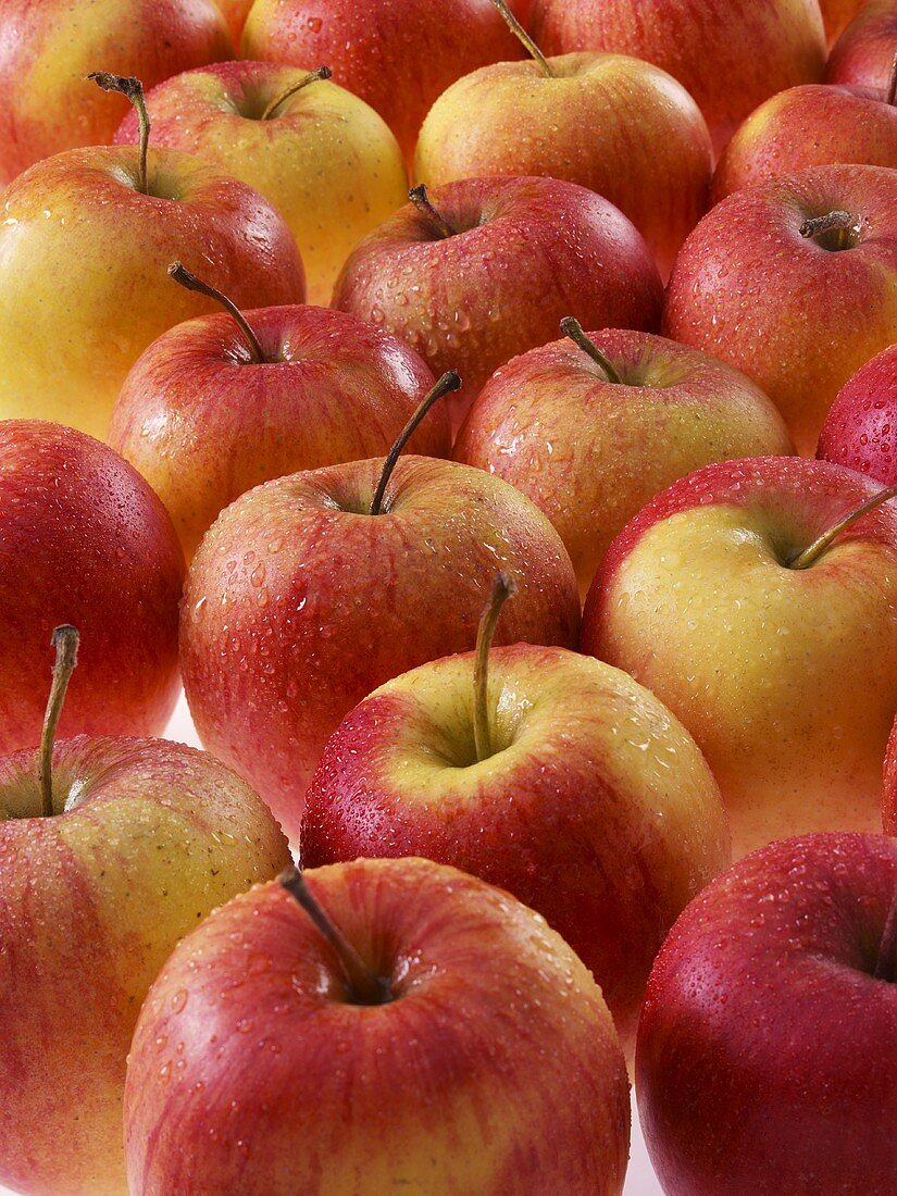 Fresh apples with drops of water (full-frame)