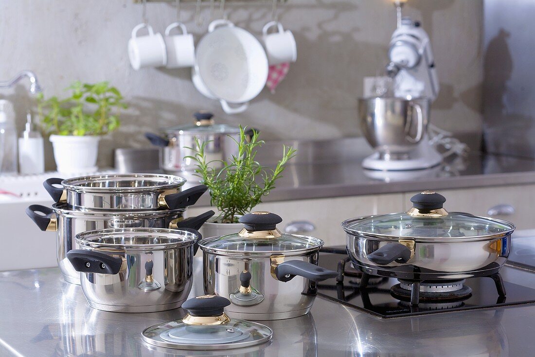 Assorted stainless steel pans in a kitchen