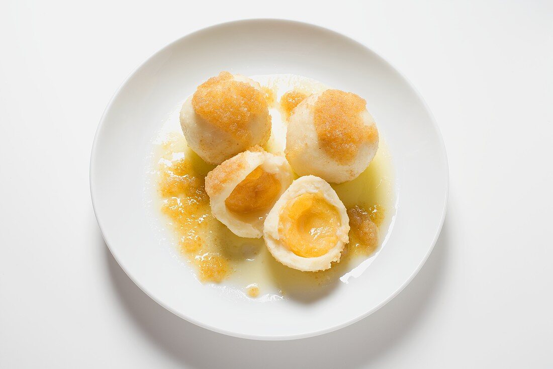 Apricot dumplings with buttered breadcrumbs