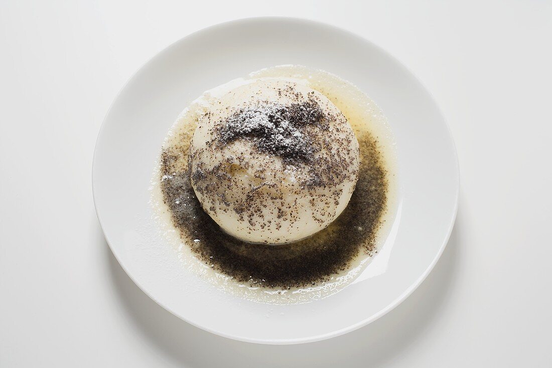 Yeast dumpling with poppy seeds, sugar and butter