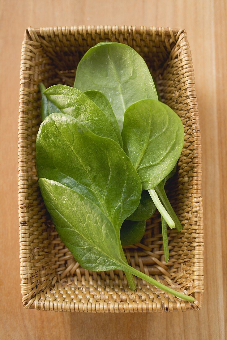 Spinach leaves in basket