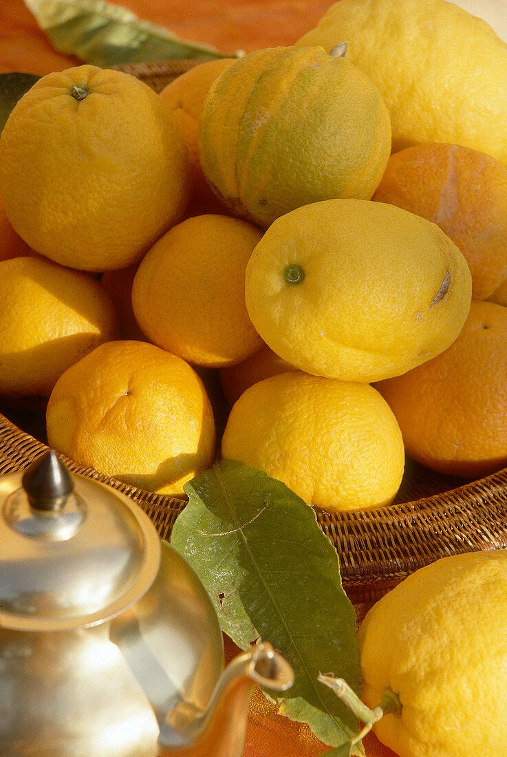 Close-up citrus fruits in basket